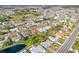 Real estate aerial view of a golf course community with lakes and mature trees at 629 Fort Duquesna Dr, Sun City Center, FL 33573