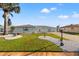 Charming home featuring a well-manicured lawn, decorative rock landscaping, and a welcoming entrance at 629 Fort Duquesna Dr, Sun City Center, FL 33573