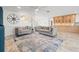 Bright living room featuring tile floors, stylish decor, and an open layout at 629 Fort Duquesna Dr, Sun City Center, FL 33573