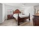 Spacious main bedroom features elegant wood furnishings and a cozy ambiance, ideal for relaxation at 629 Fort Duquesna Dr, Sun City Center, FL 33573