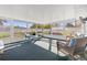 Sunroom with ample natural light, comfortable seating, and serene backyard views at 629 Fort Duquesna Dr, Sun City Center, FL 33573