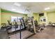 On-site fitness center equipped with treadmills, stationary bikes, and weight training equipment at 7 Elgin Pl # 202, Dunedin, FL 34698