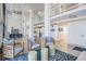 An elegant lobby offers a seating area with stylish chairs, neutral tones, and a view of the elevator at 7 Elgin Pl # 202, Dunedin, FL 34698