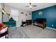 Comfortable bedroom featuring playful decor, and ample space for activities at 7034 Emerald Spring Loop, New Port Richey, FL 34653