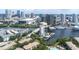 Stunning aerial view of waterfront condos featuring access to channel, bay and downtown skyline, perfect city living at 731 Cruise View Dr, Tampa, FL 33602