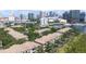 Scenic aerial view showcasing waterfront condos with city skyline backdrop and views of the bay, perfect downtown living at 731 Cruise View Dr, Tampa, FL 33602