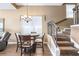 Charming dining area with staircase features a round table and chairs next to stairs, ideal for Gathering meals and gatherings at 731 Cruise View Dr, Tampa, FL 33602