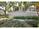 Entrance to Island Place Condominiums behind well-maintained landscaping and shrubbery at 731 Cruise View Dr, Tampa, FL 33602