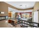 Open-concept living area with a combined kitchen, dining, and living space with balcony access perfect for modern living at 731 Cruise View Dr, Tampa, FL 33602