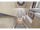 View of staircase leading up to the main living area featuring decor and plenty of natural light at 731 Cruise View Dr, Tampa, FL 33602