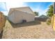 Backyard with a wooden fence, air conditioning unit, and lawn at 7551 52Nd N St, Pinellas Park, FL 33781