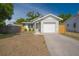 Charming single-story home with a well-manicured lawn, an attached garage and modern finishes at 7551 52Nd N St, Pinellas Park, FL 33781