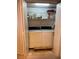 Convenient laundry closet equipped with a washer and dryer unit at 7616 Colonial Ct, Tampa, FL 33615