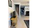 Inviting living area with staircase, fireplace, and view of the kitchen at 7616 Colonial Ct, Tampa, FL 33615