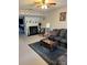 Cozy living room featuring a fireplace and comfortable seating arrangement at 7616 Colonial Ct, Tampa, FL 33615