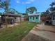 Fenced backyard features a gazebo, a small shed, and a patio, perfect for outdoor entertaining and relaxation at 7920 52Nd N St, Pinellas Park, FL 33781