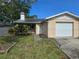 Charming single-story home with a well-maintained lawn and attached one car garage at 7920 52Nd N St, Pinellas Park, FL 33781