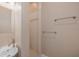 Cozy bathroom featuring a stylish sink, tiled walk-in shower, and neutral walls at 941 65Th S St, St Petersburg, FL 33707