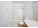 Clean bathroom featuring a tub and shower, toilet, and a light wood vanity with a mirror at 10255 Devonshire Lake Dr, Tampa, FL 33647