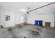 Spacious two-car garage with ample room for vehicles, storage, and projects at 10255 Devonshire Lake Dr, Tampa, FL 33647