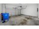 Spacious two-car garage with ample space for parking and storage, suitable for vehicles and equipment at 10255 Devonshire Lake Dr, Tampa, FL 33647