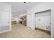 Open concept view of kitchen featuring tile flooring and modern appliances at 10255 Devonshire Lake Dr, Tampa, FL 33647