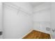 Walk-in closet with wire shelves, providing ample storage space in this home at 10255 Devonshire Lake Dr, Tampa, FL 33647