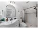 Updated bathroom features modern fixtures, white tiling, and an elegant vanity at 11110 105Th Ave, Largo, FL 33778