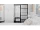 Bedroom includes closet area with unique, stylish sliding door detail at 11110 105Th Ave, Largo, FL 33778