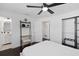 Bright bedroom features modern furnishings, closet space, and ample natural light at 11110 105Th Ave, Largo, FL 33778
