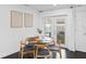 Cozy dining area with modern furnishings and natural light, adjacent to the patio and pool area at 11110 105Th Ave, Largo, FL 33778
