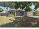 Charming home featuring a well-maintained front yard and a classic exterior with a two-car garage at 11110 105Th Ave, Largo, FL 33778