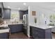 Charming kitchen with stainless steel appliances, quartz counters, and modern cabinetry at 11110 105Th Ave, Largo, FL 33778
