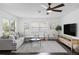 Comfortable living room showcasing neutral tones, modern decor, and an inviting atmosphere at 11110 105Th Ave, Largo, FL 33778