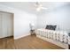 Bedroom offers wood-look vinyl flooring, closet, built in daybed with pull out drawers and lots of light at 11447 Park Blvd # 205, Seminole, FL 33772