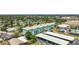A pleasing exterior view of the community includes a pool at 11447 Park Blvd # 205, Seminole, FL 33772
