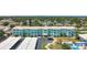 A street view displays the building and the covered parking at 11447 Park Blvd # 205, Seminole, FL 33772