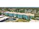 A corner view shows this charming building at 11447 Park Blvd # 205, Seminole, FL 33772