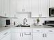 The fully renovated kitchen boasts quartz countertops at 11447 Park Blvd # 205, Seminole, FL 33772