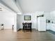 Bright kitchen boasts new appliances, modern cabinetry and space for dining with wood-look vinyl floors at 11447 Park Blvd # 205, Seminole, FL 33772