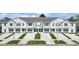 Charming townhomes feature private garages, driveways, and inviting landscaping enhancing curb appeal at 11742 Blackbrook Ct, Seffner, FL 33584