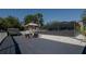 Expansive deck featuring a gazebo, screened-in pool, and outdoor seating, ideal for outdoor enjoyment at 12416 Queensland Ln, Tampa, FL 33625