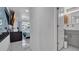 Hallway with bathroom and bedroom access at 12416 Queensland Ln, Tampa, FL 33625