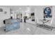 Bright kitchen with stainless steel appliances, granite countertops, and a cozy breakfast nook at 12416 Queensland Ln, Tampa, FL 33625