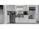 Well-equipped kitchen with stainless steel appliances, and granite countertops at 12416 Queensland Ln, Tampa, FL 33625