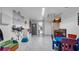 Large playroom with ample natural light and plenty of space for play and learning at 12416 Queensland Ln, Tampa, FL 33625