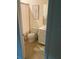 Small bathroom features a toilet, shower/tub combination, and a vanity with a sink at 12619 Richezza Dr, Venice, FL 34293