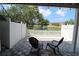 Paver patio with view of community pond and fountain at 13755 Orange Sunset Dr # 101, Tampa, FL 33618