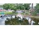 Scenic waterfront view with boat dock and community access, creating a picturesque setting at 13755 Orange Sunset Dr # 101, Tampa, FL 33618