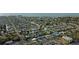 High-angle aerial showcasing neighborhoods and access to canals and the open waterway in the coastal region at 13800 Judy Ave, Hudson, FL 34667